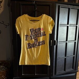Wound Up Yellow Graphic Tee with 'Your Potential Is Endless' Slogan